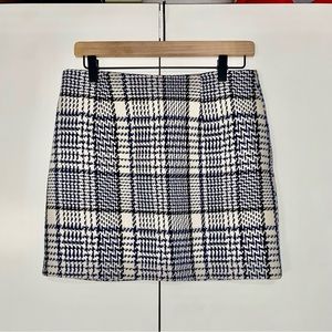 Tweed mini skirt. Blue, black, and white tartan.